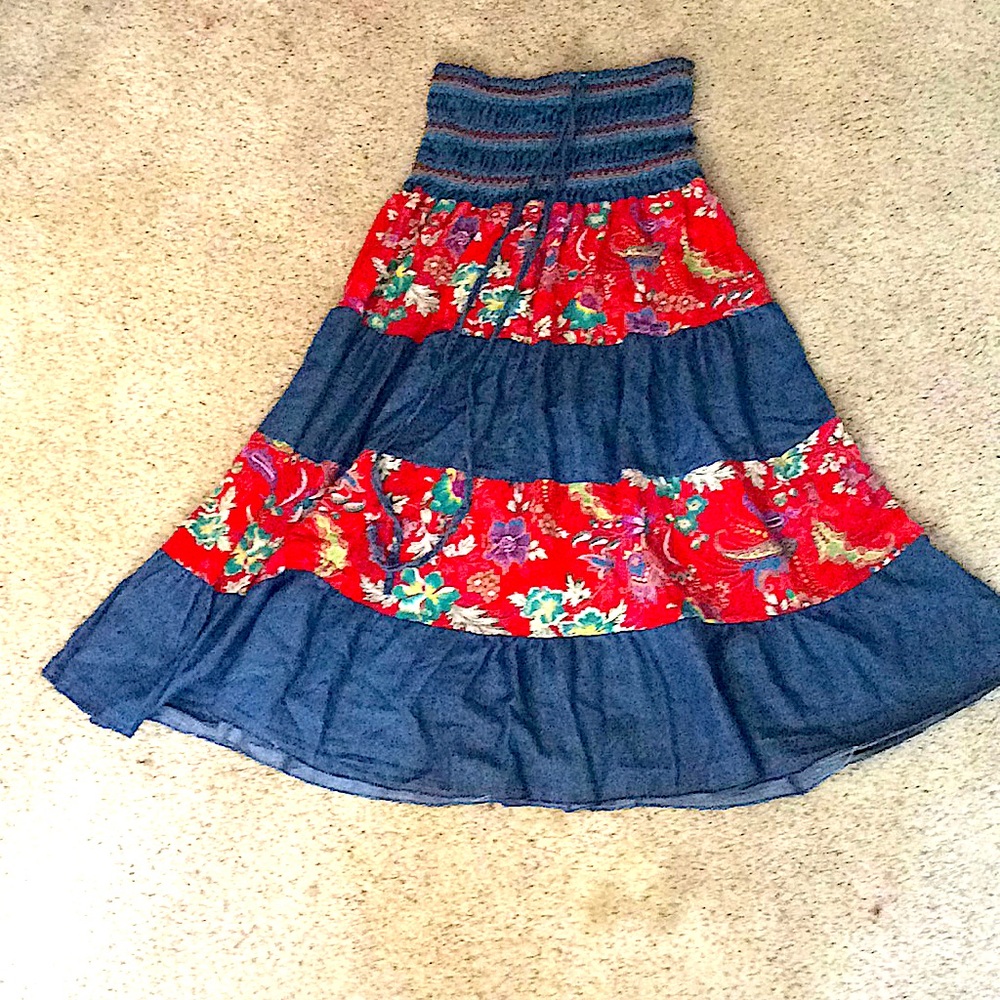 Women’s long blue and red skirt.